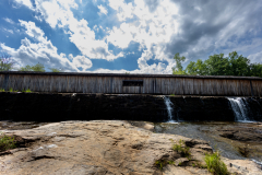 Covered bridge slow dam waters Covered bridge slow dam waters