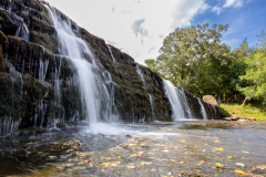 Low, wide angle long exposure dam waterfall Low, wide angle long exposure dam waterfall